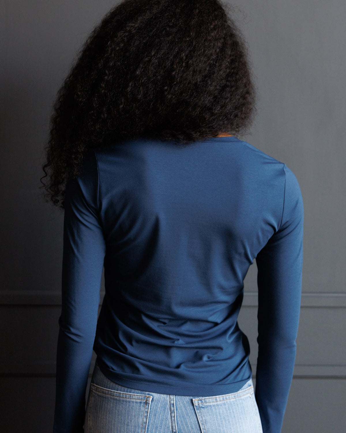 Downeast Essential Long Sleeve Tee in soft fabric, featuring a classic fit and crew neckline, shown on a neutral background.