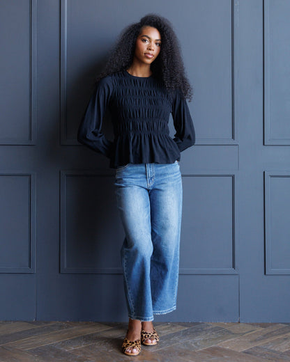 Downeast long sleeve smocked tee in soft fabric, featuring a relaxed fit and smocked detail on the sleeves.