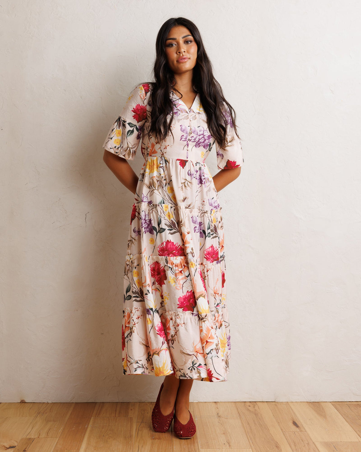 Downeast Mcintosh maxi dress with floral pattern, flowing fabric, and sleeveless design, perfect for summer or casual occasions.