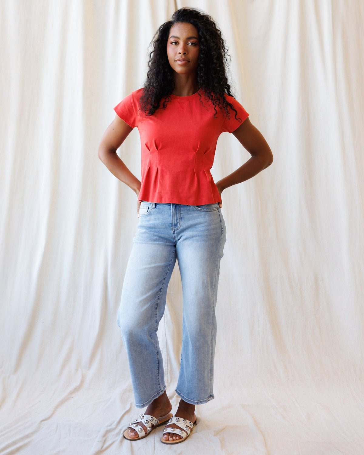 Downeast Pretty Sporty Tee, casual women's top in soft fabric with a relaxed fit and short sleeves, displayed on a hanger.