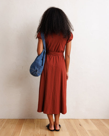 Downeast Sugar & Spice dress featuring a floral pattern, sleeveless design, and lightweight fabric on a hanger.
