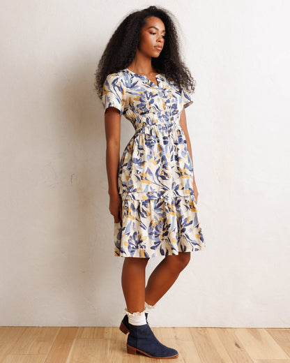 Downeast Icon Demi Dress in floral print with short sleeves and V-neck, displayed on a mannequin.