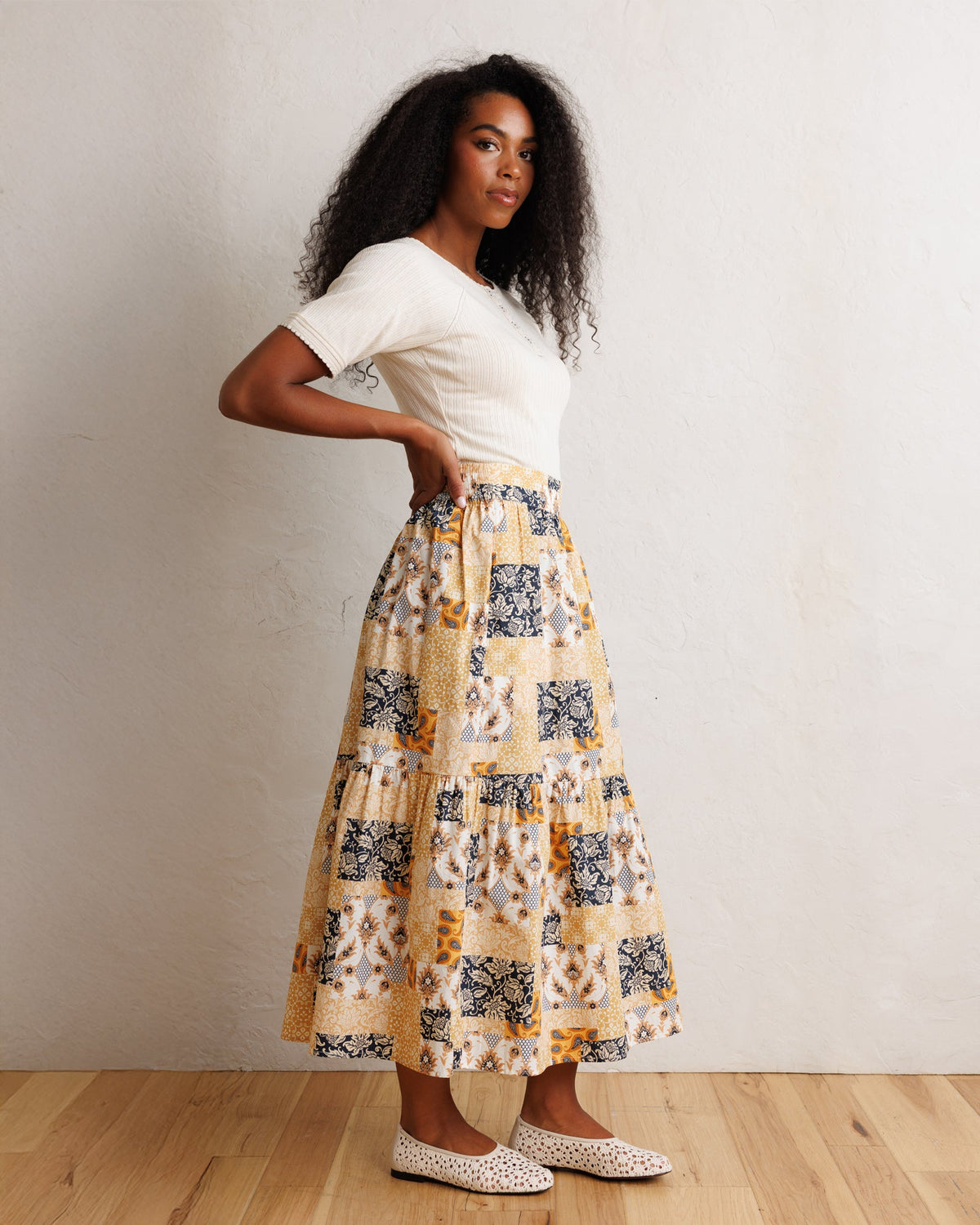 Downeast heirloom skirt featuring a flowing fabric, intricate pattern, and classic design, perfect for casual or dressy occasions.