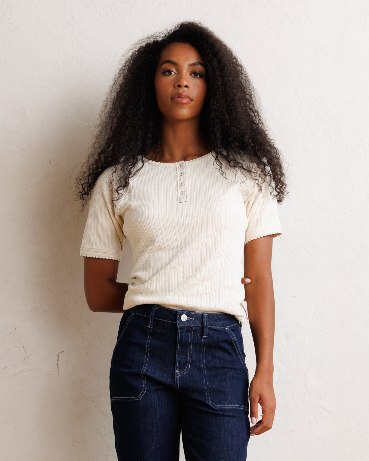 Downeast Pointelle Pretty Top shown in soft pastel with delicate knit pattern and elegant design, ideal for casual or dressy wear.