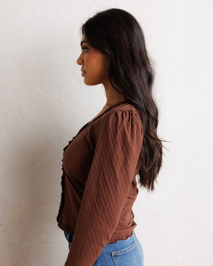 Downeast Carry On Cardi, a cozy knit top in neutral color, featuring a relaxed fit and button-front design.