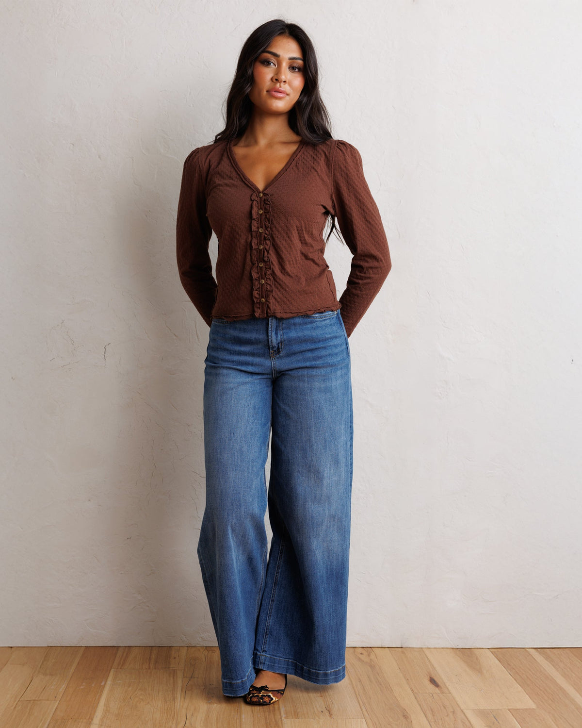 Downeast Carry On Cardi top in soft fabric with long sleeves and open front, styled casually.