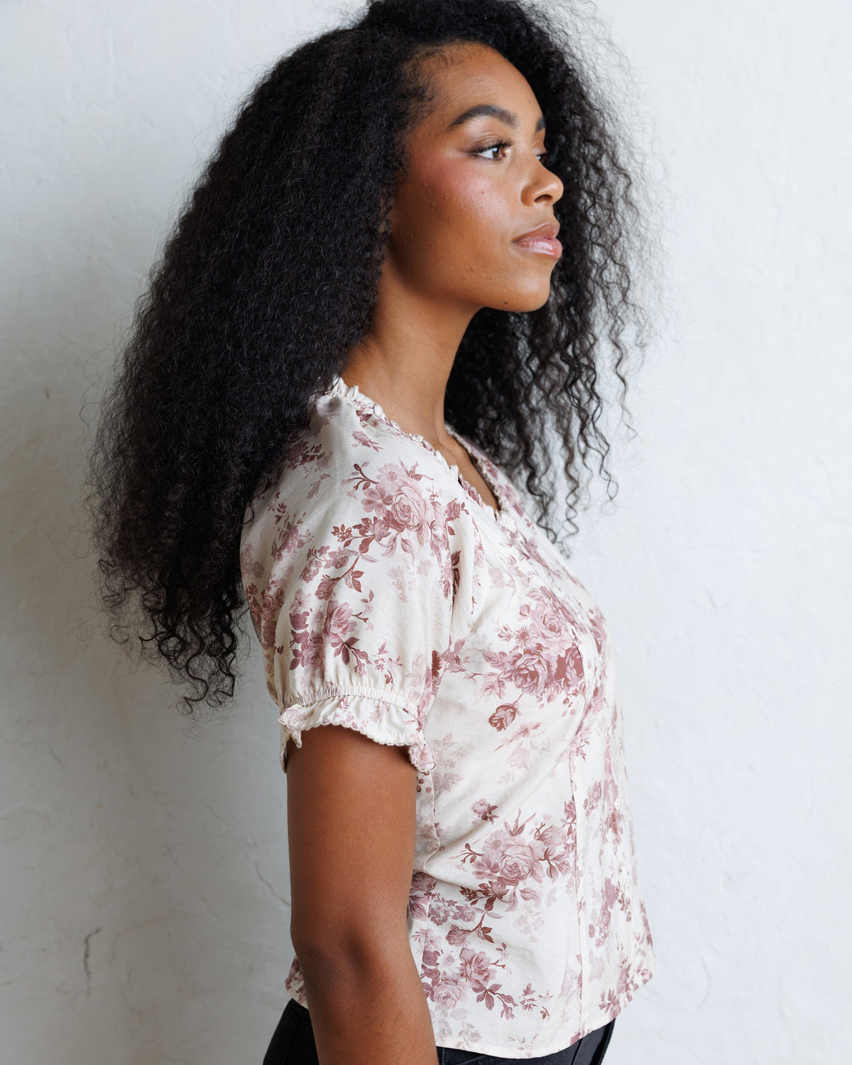 Downeast La Vie En Rose top featuring a stylish, feminine design with floral patterns and lightweight fabric.