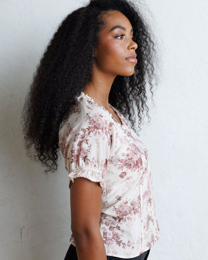 Downeast La Vie En Rose top featuring a stylish, feminine design with floral patterns and lightweight fabric.