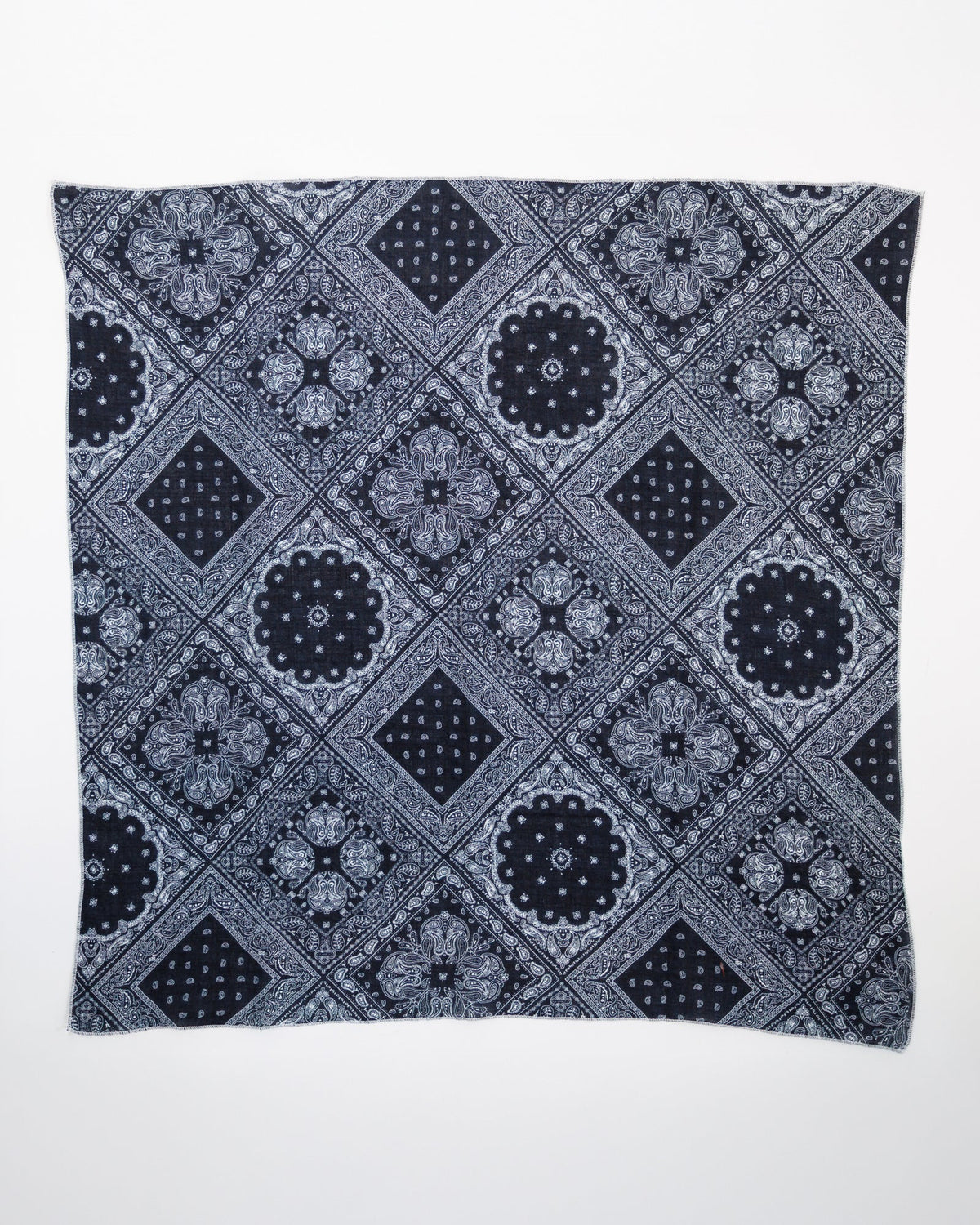 Downeast The Daily Scarf in neutral tones, soft fabric, styled loosely around the neck for a casual, cozy look