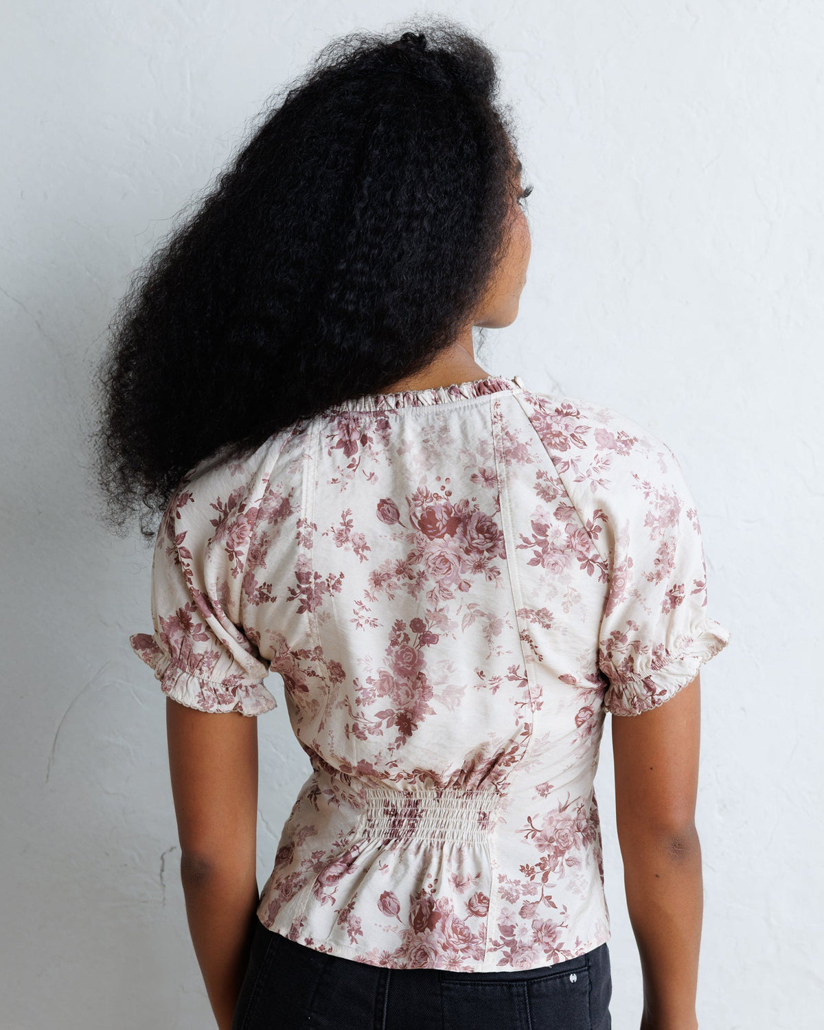Downeast La Vie En Rose top featuring floral print and lightweight fabric, styled with a relaxed fit and short sleeves.