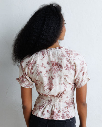 Downeast La Vie En Rose top featuring floral print and lightweight fabric, styled with a relaxed fit and short sleeves.