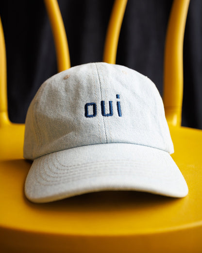 Downeast Say Oui hat in stylish fabric, featuring a curved brim and adjustable strap for a casual, fashionable look.