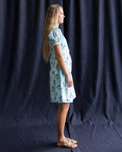 Downeast Bluebell Dress displayed with floral pattern, sleeveless design, and flowy fabric perfect for casual or summer wear.