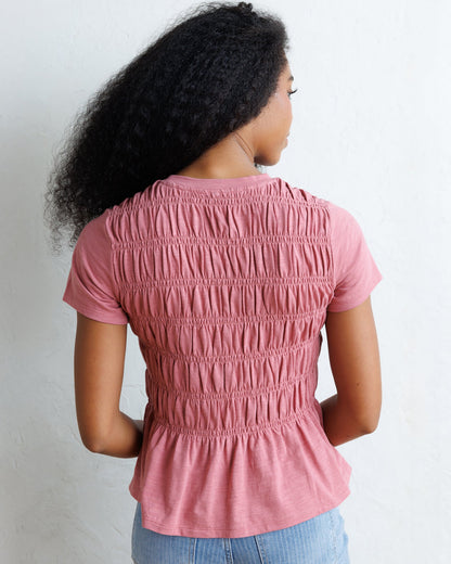 Downeast smocked tee top in soft fabric with a fitted, gathered design, featuring a casual and stylish look.