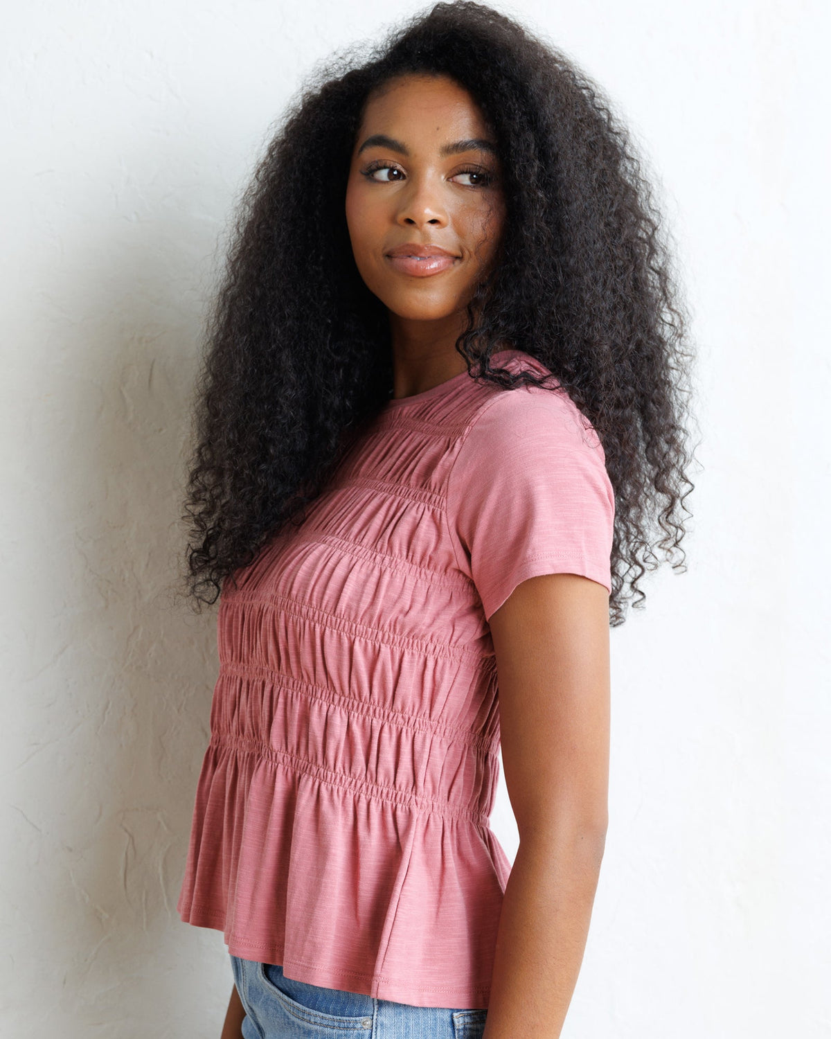 Downeast smocked tee top with a fitted silhouette, featuring a smocked bodice and short sleeves, casual and stylish for everyday wear.