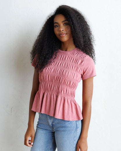 Downeast smocked tee top featuring a fitted, stylish design with smocked detailing and short sleeves, perfect for casual wear.