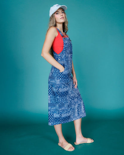 Downeast OOTD overalls dress, casual style with adjustable straps, front pockets, and a relaxed fit, worn as a fashionable daytime outfit.