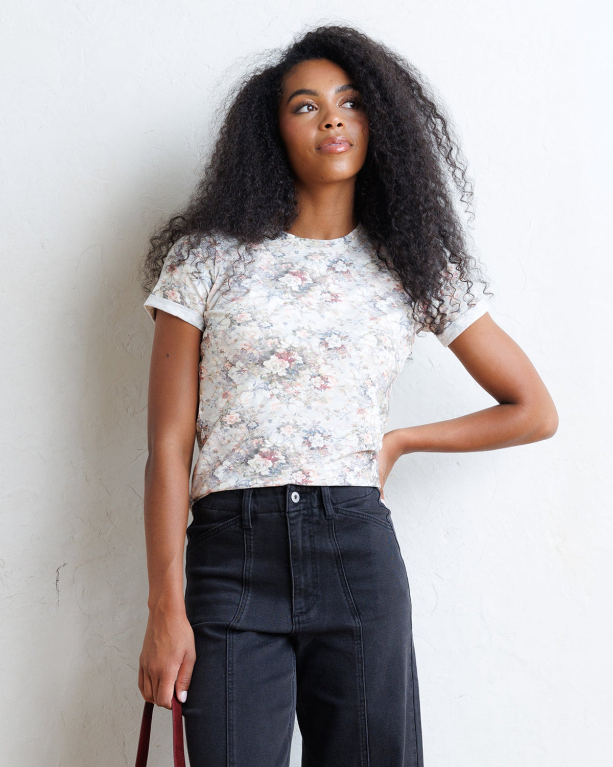 Downeast Go Floral Tee showing a casual tops with a vibrant floral pattern and short sleeves.