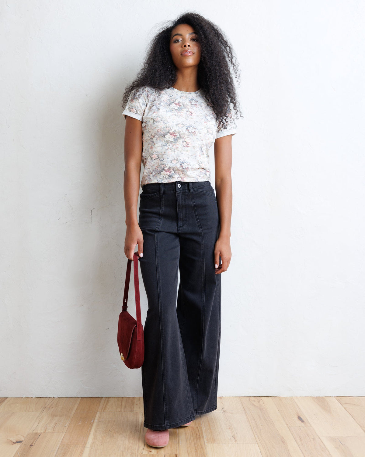 Downeast Go Floral Tee, a casual tops with a vibrant floral pattern, shown on a model with a relaxed fit and short sleeves.