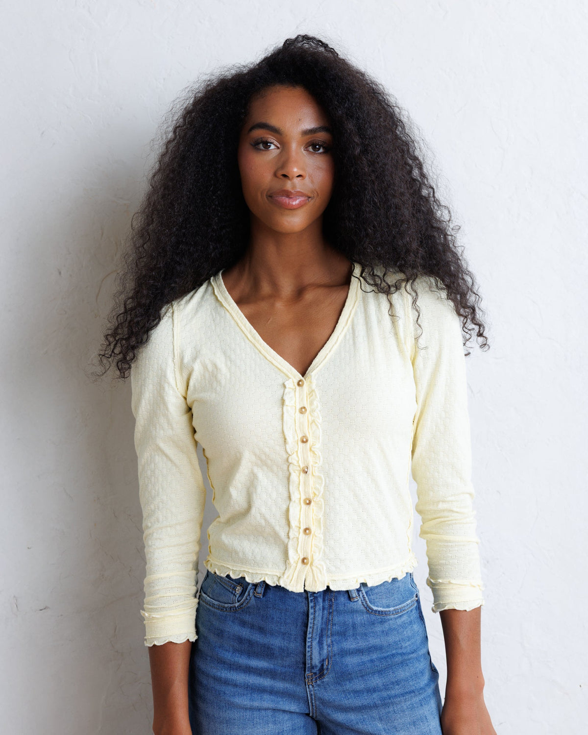 Downeast Carry On Cardi top shown in soft, lightweight fabric with a relaxed fit and button front design.