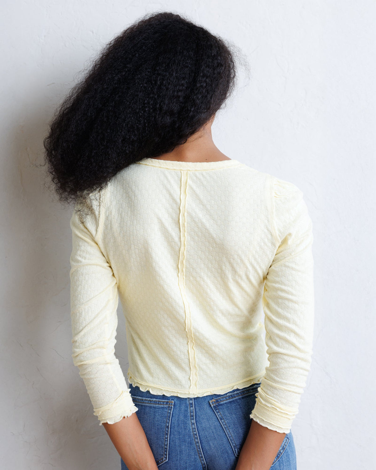 Downeast Carry On Cardi top in soft fabric, shown in a relaxed fit with long sleeves and open front design.