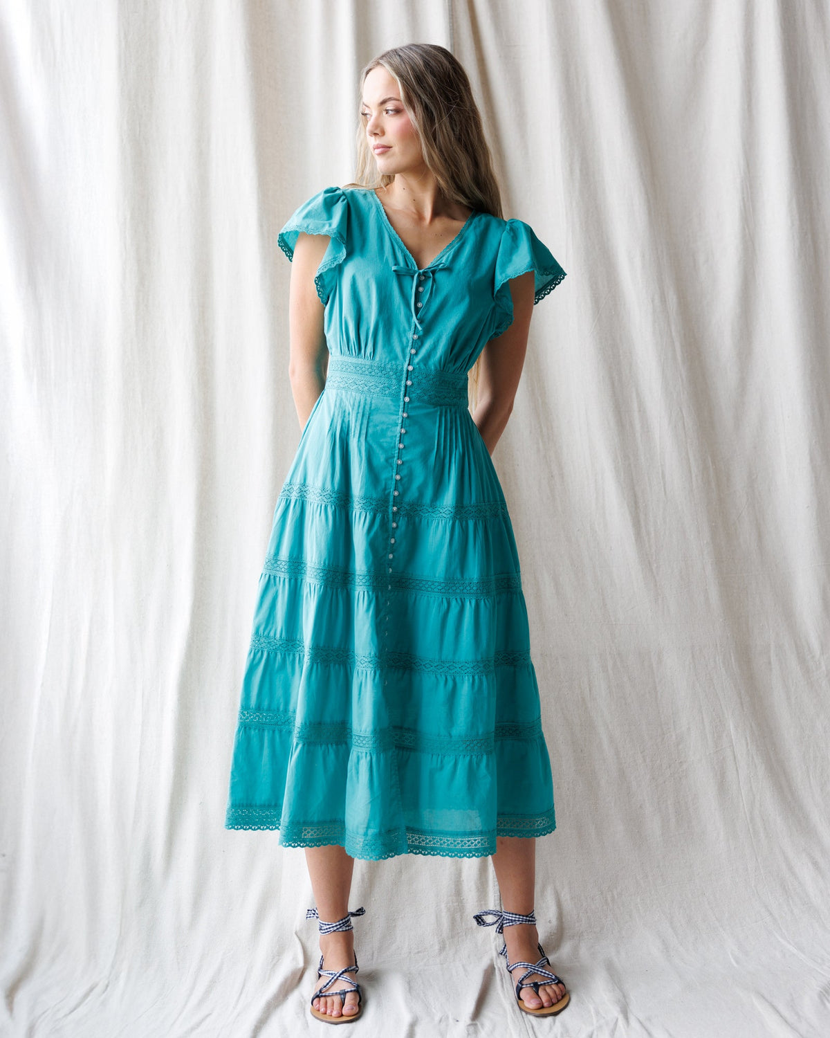 Downeast heirloom dress featuring intricate embroidery, soft fabric, and a classic, elegant design perfect for special occasions.