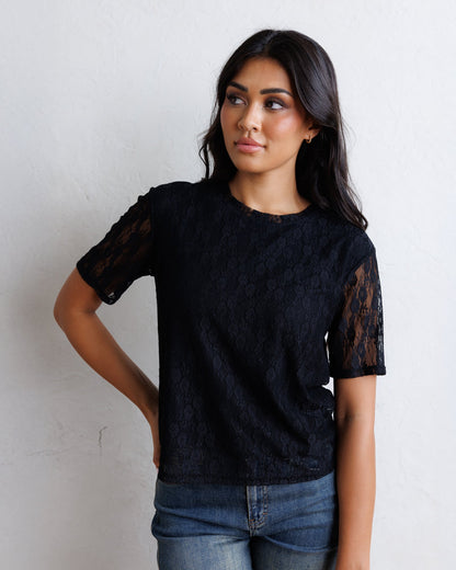 Downeast Laid Back Lace Tee top, lightweight casual blouse with lace details, shown on a hanger.