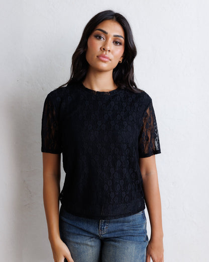 Downeast Laid Back Lace Tee top featuring soft fabric and lace details, shown on a hanger.