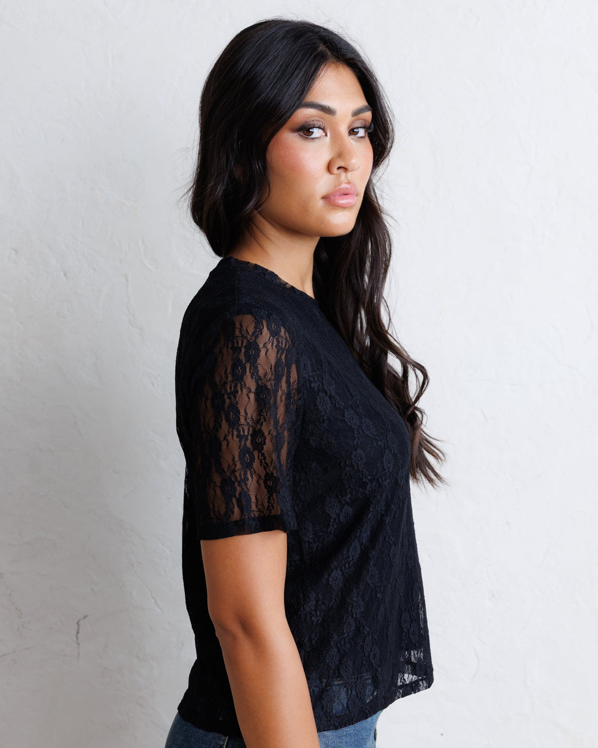 Downeast Laid Back Lace Tee, stylish women's top with lace detailing, shown in a relaxed fit on a flat lay.