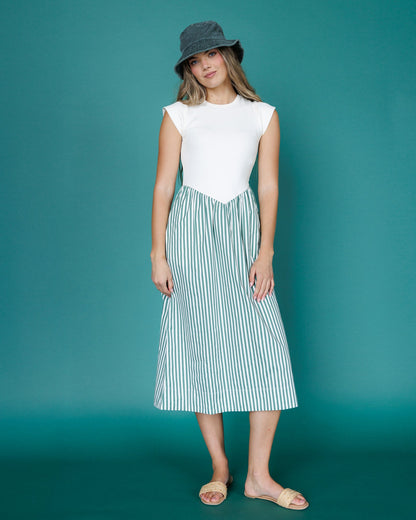 Downeast Valencia dress featuring a flowy, patterned fabric with a V-neck and short sleeves, perfect for casual or semi-formal wear.