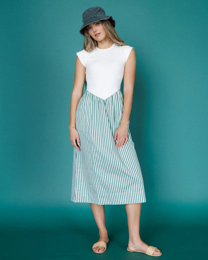 Downeast Valencia Dress shown in a flowing, lightweight fabric with a stylish design, perfect for casual or semi-formal occasions.