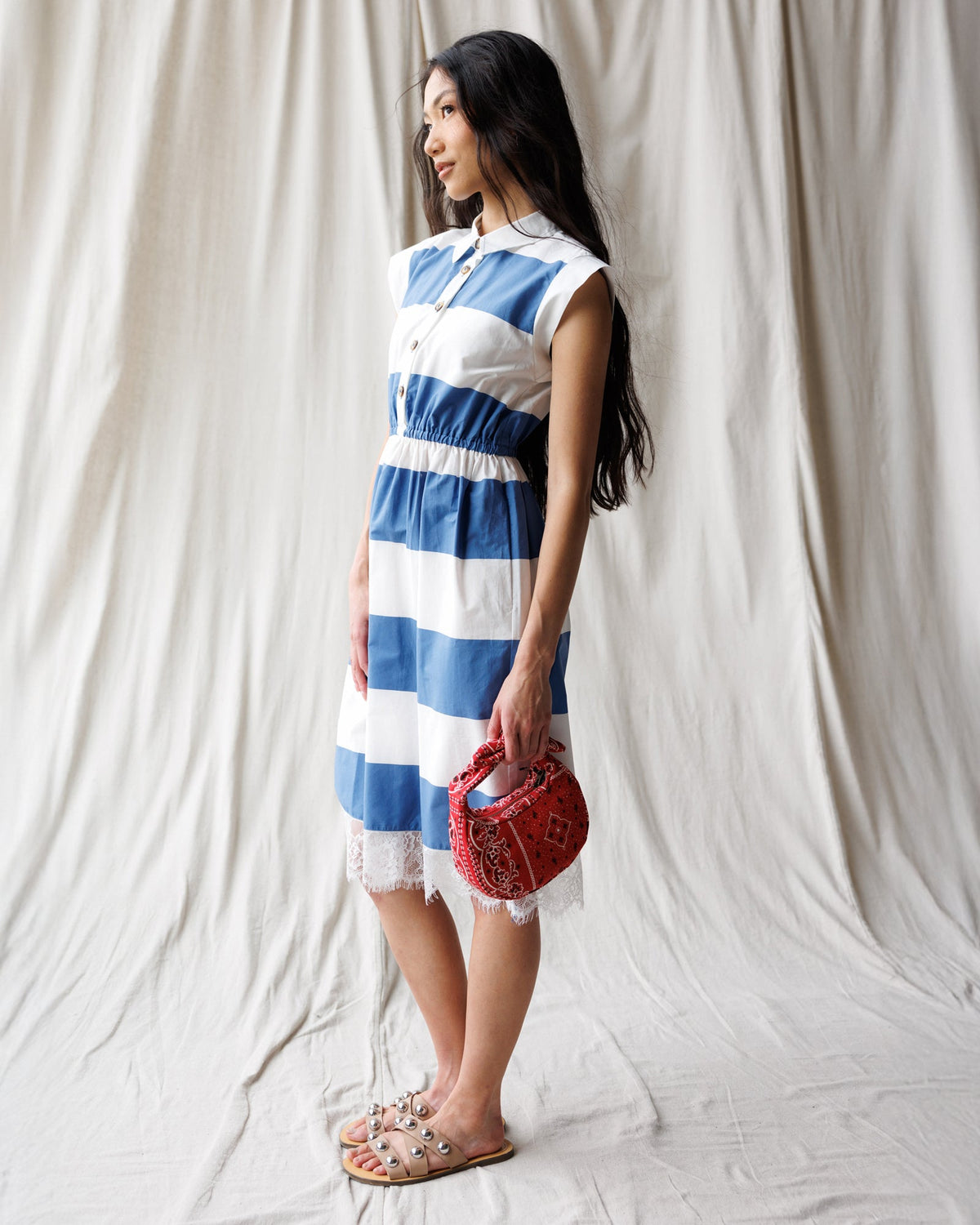 Downeast Hamptons Dress, casual sleeveless summer dress with floral print and relaxed fit, displayed on a hanger.
