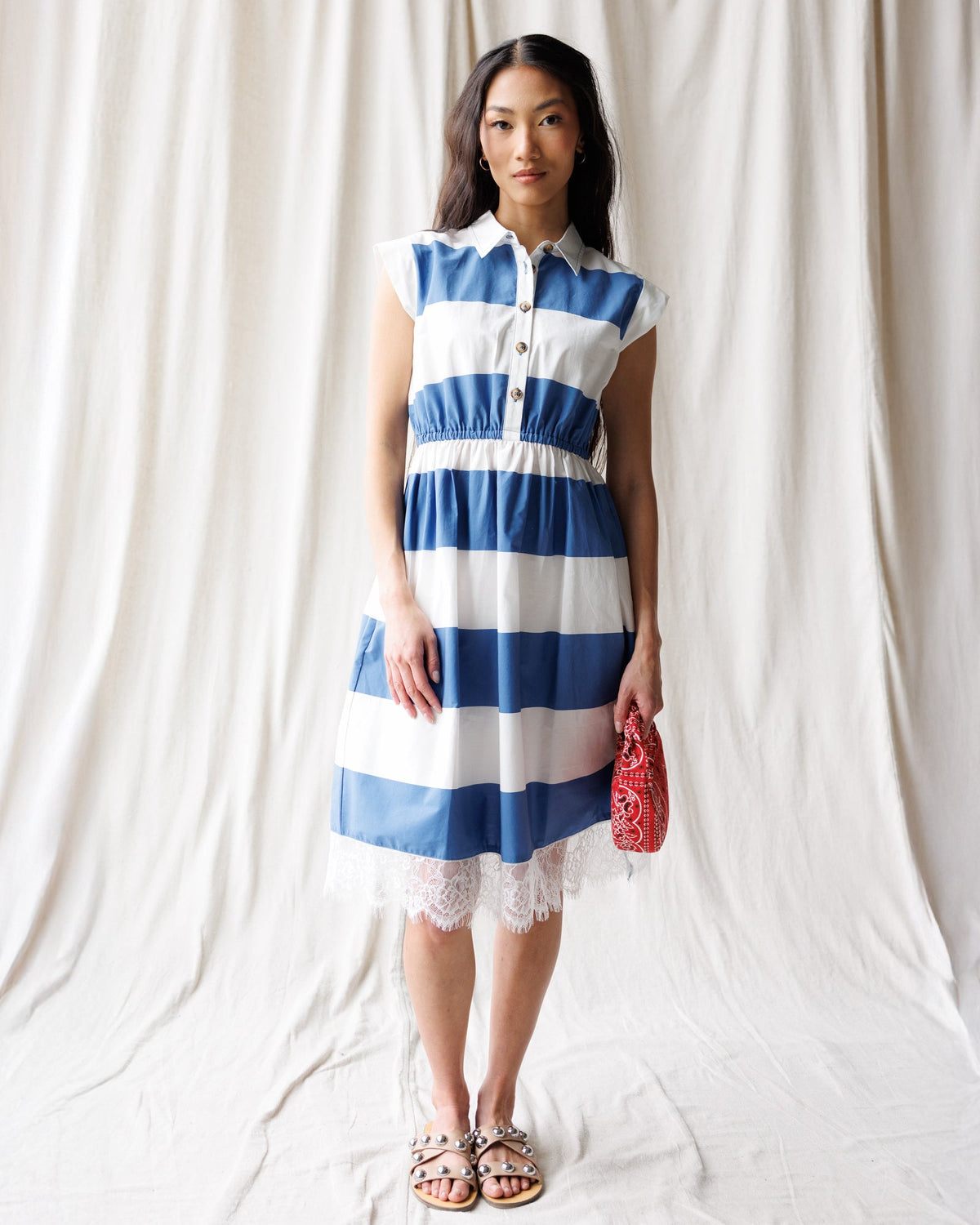 Downeast Hamptons dress displayed on a hanger, featuring a flowy, patterned fabric perfect for casual or summer wear.