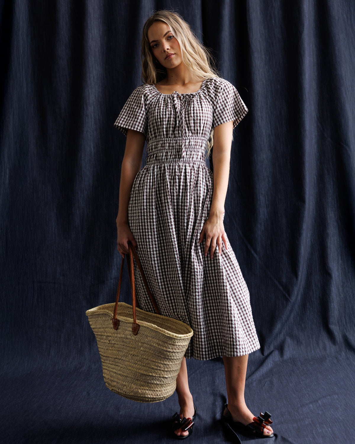 Downeast Maybelle Dress in soft fabric with floral pattern, featuring a fitted waist and flowing skirt, perfect for casual wear.
