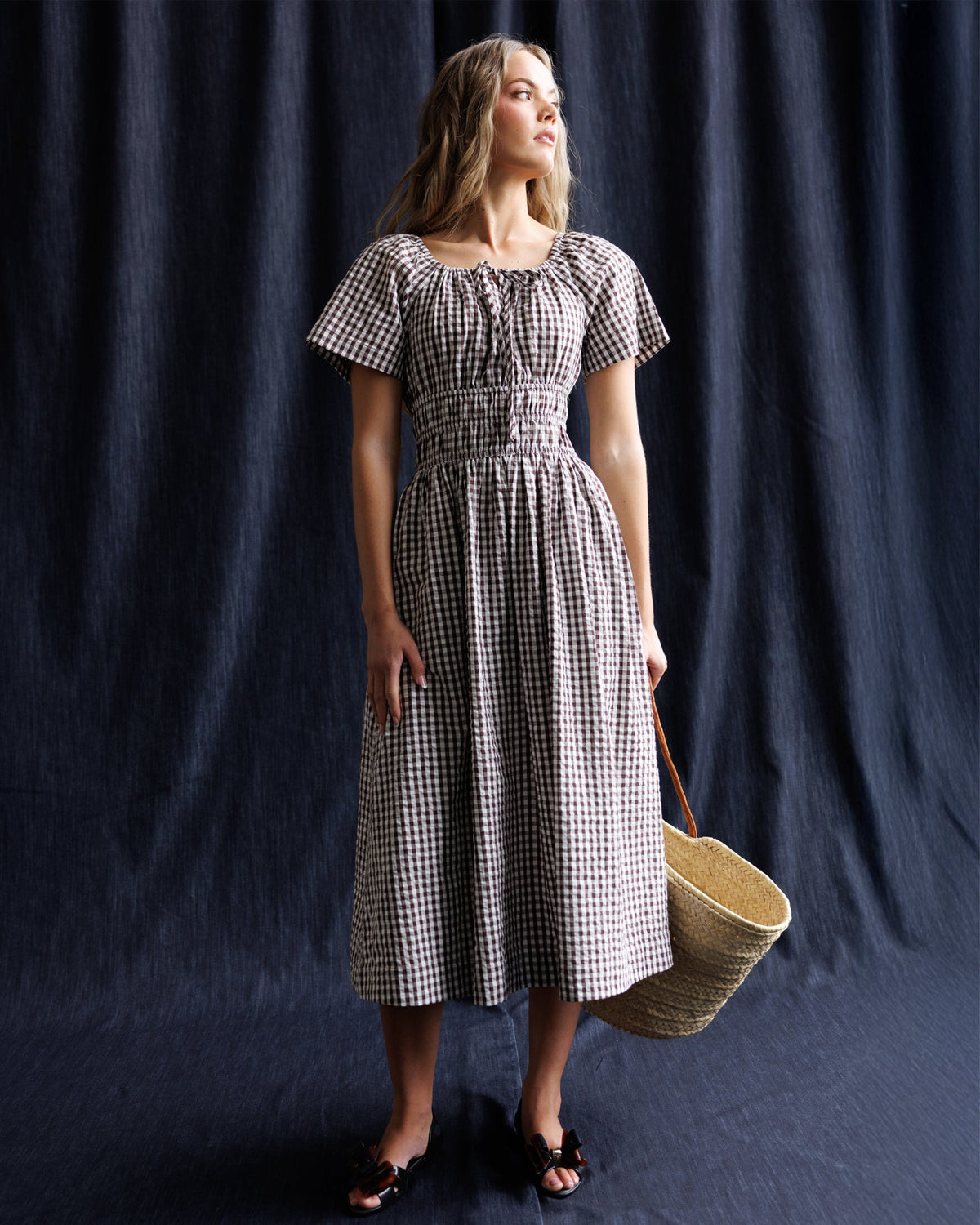 Downeast Maybelle Dress in floral print, sleeveless design with a fitted bodice and flowing skirt, perfect for summer wear.