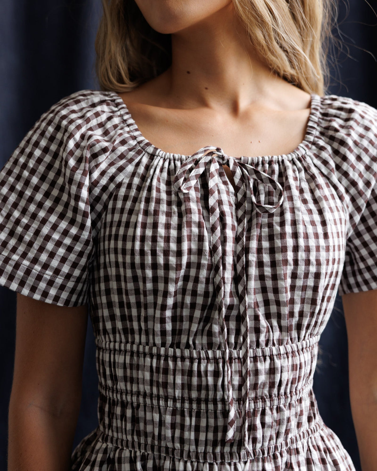 Downeast Maybelle Dress in lightweight fabric with floral pattern, featuring a relaxed fit and short sleeves.