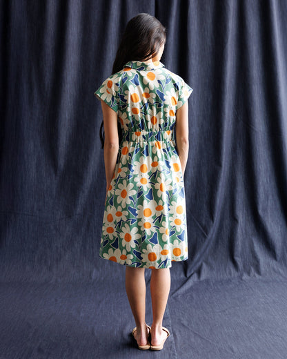Downeast Newberry Dress in soft fabric with a flowing silhouette, featuring a floral pattern and a V-neckline.