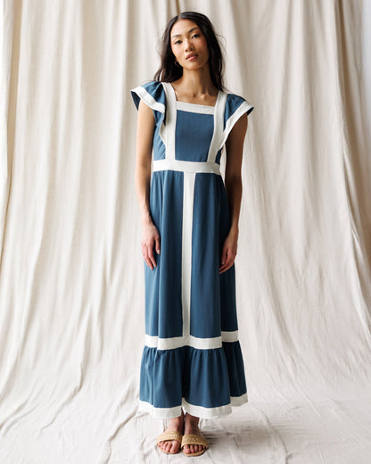 Downeast Block Party Dress with colorful floral pattern, sleeveless design, and knee-length fit, perfect for casual summer wear.