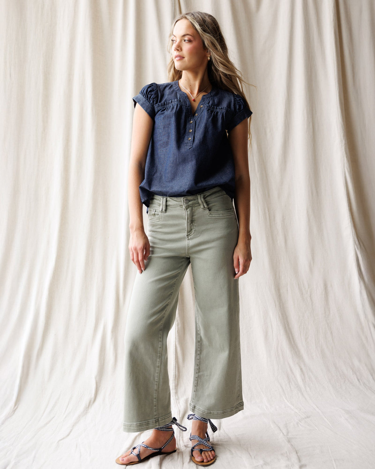 Downeast Super High Wide Cropped Utility Denim pants displayed on a model with a relaxed fit and distressed details.