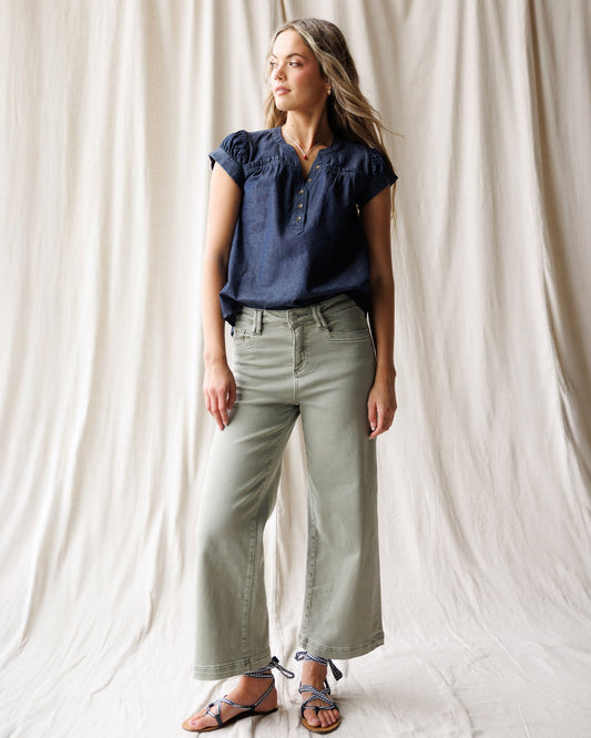 Downeast Super High Wide Cropped Utility Denim pants displayed on a model with a relaxed fit and distressed details.