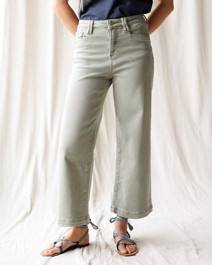 Downeast super high wide cropped denim utility pants shown on a model, featuring a relaxed fit and classic denim texture.