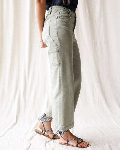Downeast super high wide cropped denim utility pants with a relaxed fit and distressed details.