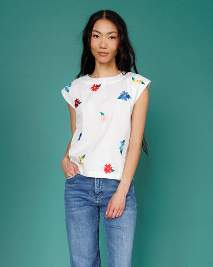 Downeast Flower Farm Top in vibrant floral print, lightweight blouse with short sleeves and relaxed fit.