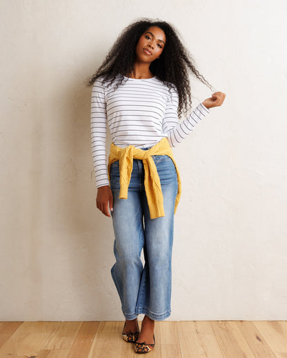 Downeast Essential Long Sleeve Tee, casual tops in soft fabric, with a relaxed fit and crew neckline, shown on a hanger.