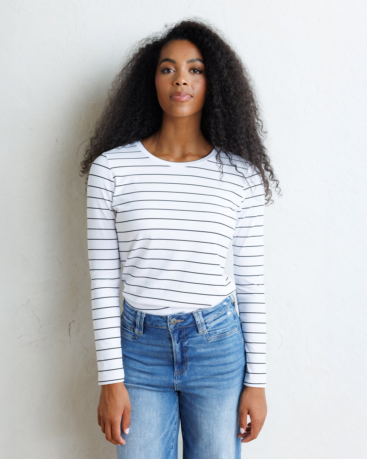 Downeast Essential Long Sleeve Tee, soft cotton top in a versatile color, shown with a relaxed fit and simple neckline.