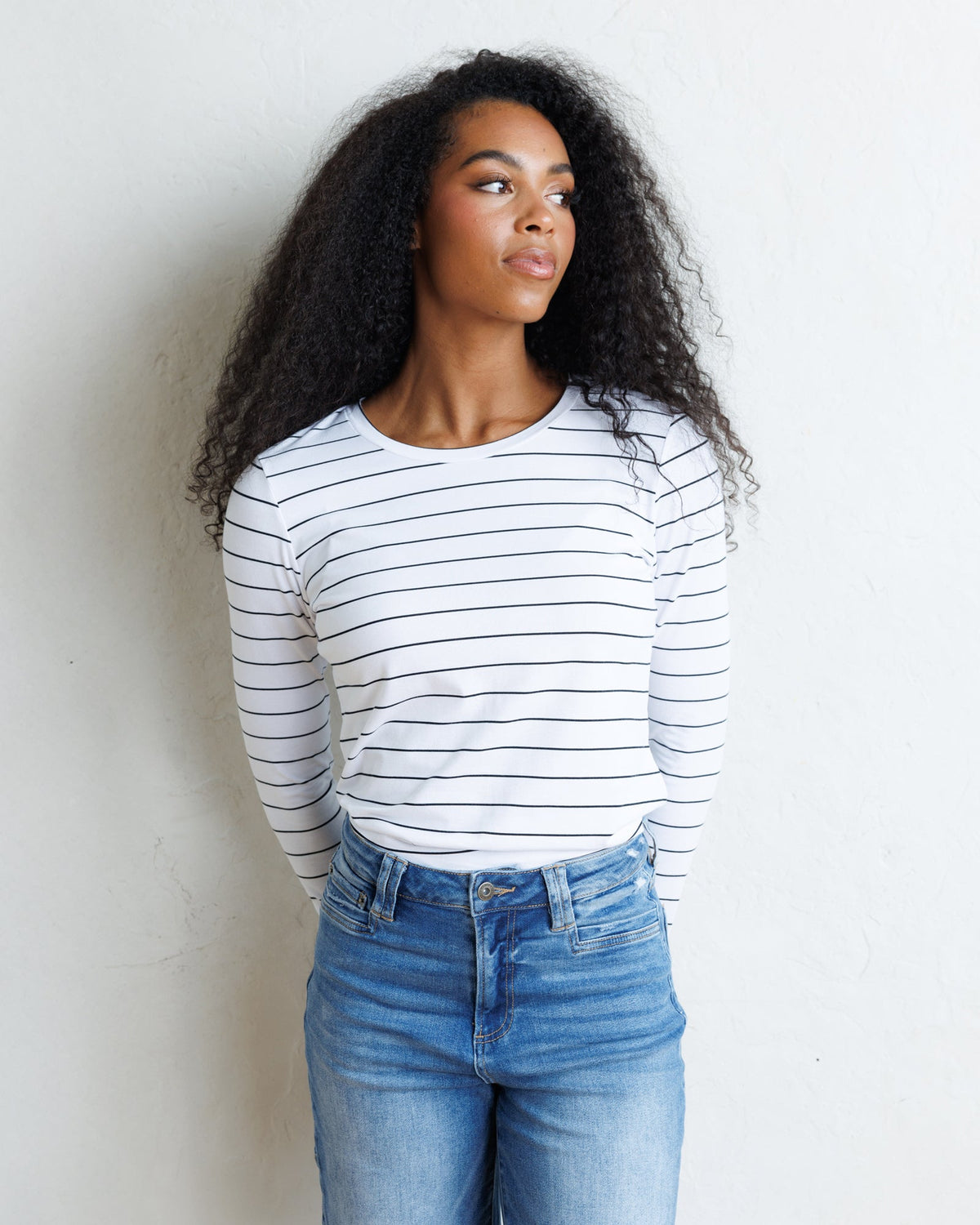 Downeast Essential Long Sleeve Tee in soft fabric, featuring a classic fit and crew neckline, displayed on a neutral background.
