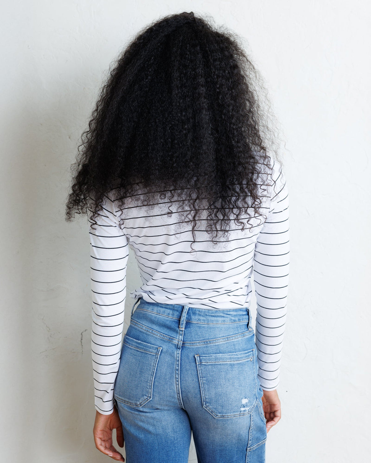 Downeast Essential Long Sleeve Tee in soft fabric, showing a close-up of the comfortable, fitted long sleeve top.