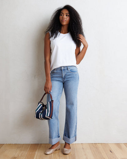 Downeast mid-rise wide stripe denim jeans showing a relaxed fit and stylish blue and white vertical stripe pattern.