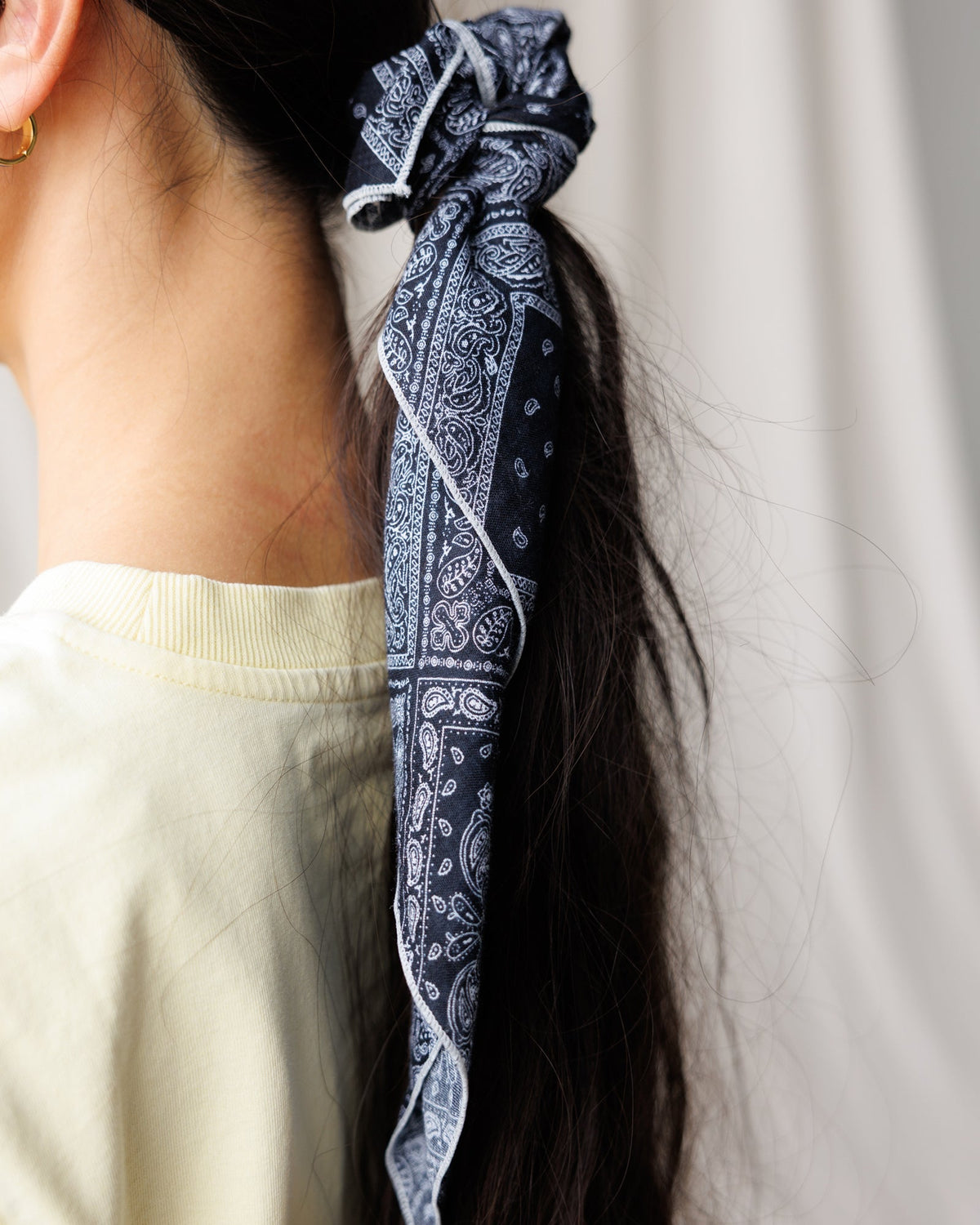 Downeast The Daily Scarf in soft fabric, featuring a stylish pattern, perfect for casual wear and adding a cozy touch to outfits.