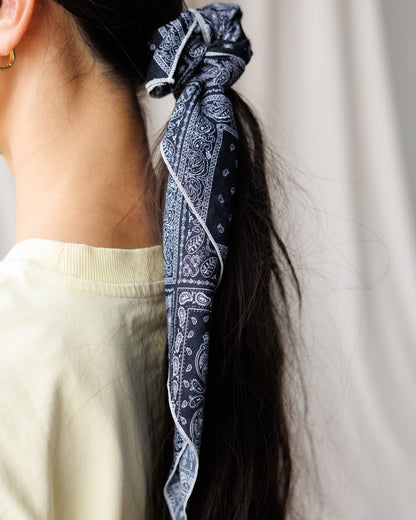 Downeast The Daily Scarf in soft fabric, featuring a stylish pattern, perfect for casual wear and adding a cozy touch to outfits.